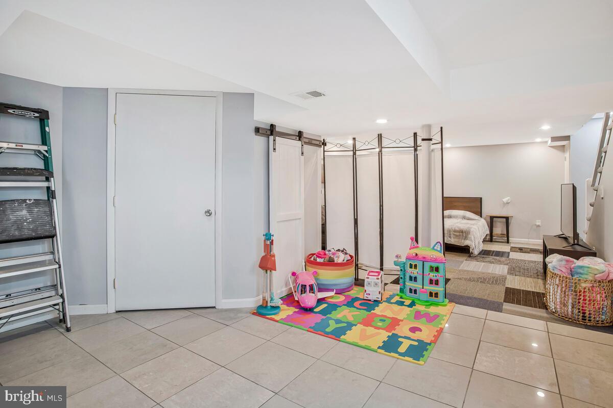 7215 Conley Street Baltimore, MD 21224 - Photo 32 of 38 a play room with toys