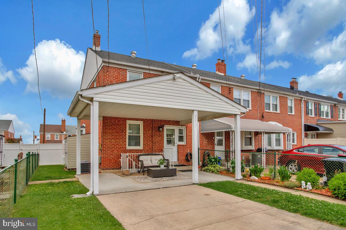 7215 Conley Street Baltimore, MD 21224 - Photo 35 of 38 a view of a building with sitting area