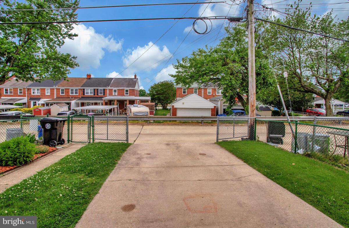 7215 Conley Street Baltimore, MD 21224 - Photo 37 of 38 a view of a street with houses