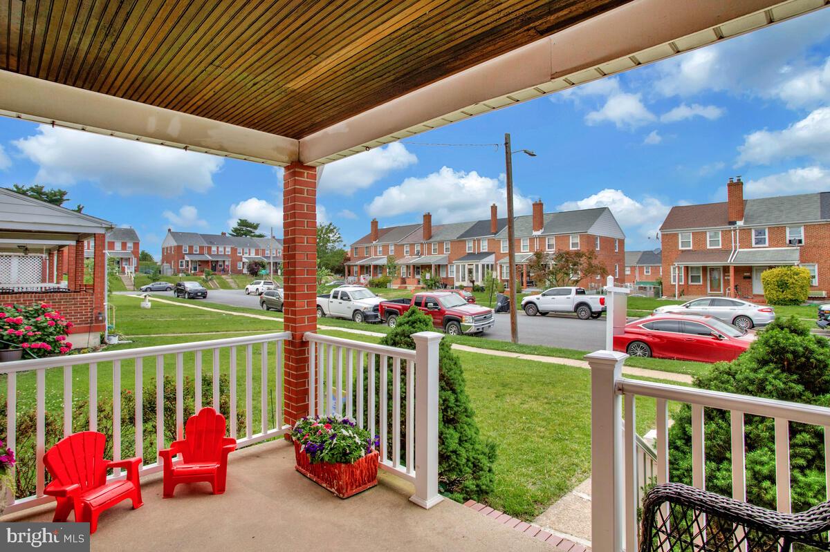 7215 Conley Street Baltimore, MD 21224 - Photo 5 of 38 a view of a porch with furniture