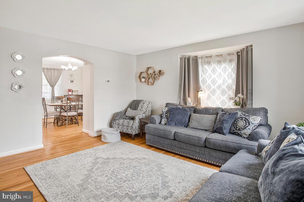 7215 Conley Street Baltimore, MD 21224 - Photo 7 of 38 a living room with furniture and a window