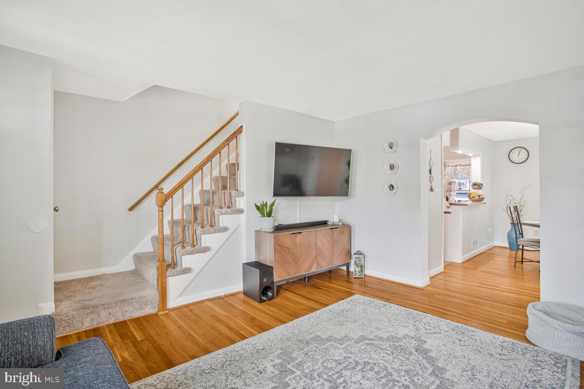 7215 Conley Street Baltimore, MD 21224 - Photo 10 of 38 a living room with furniture and a flat screen tv
