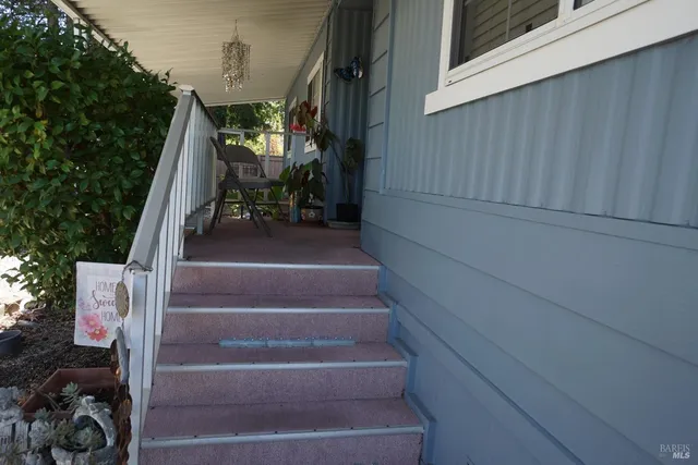 a view of entryway with a front door