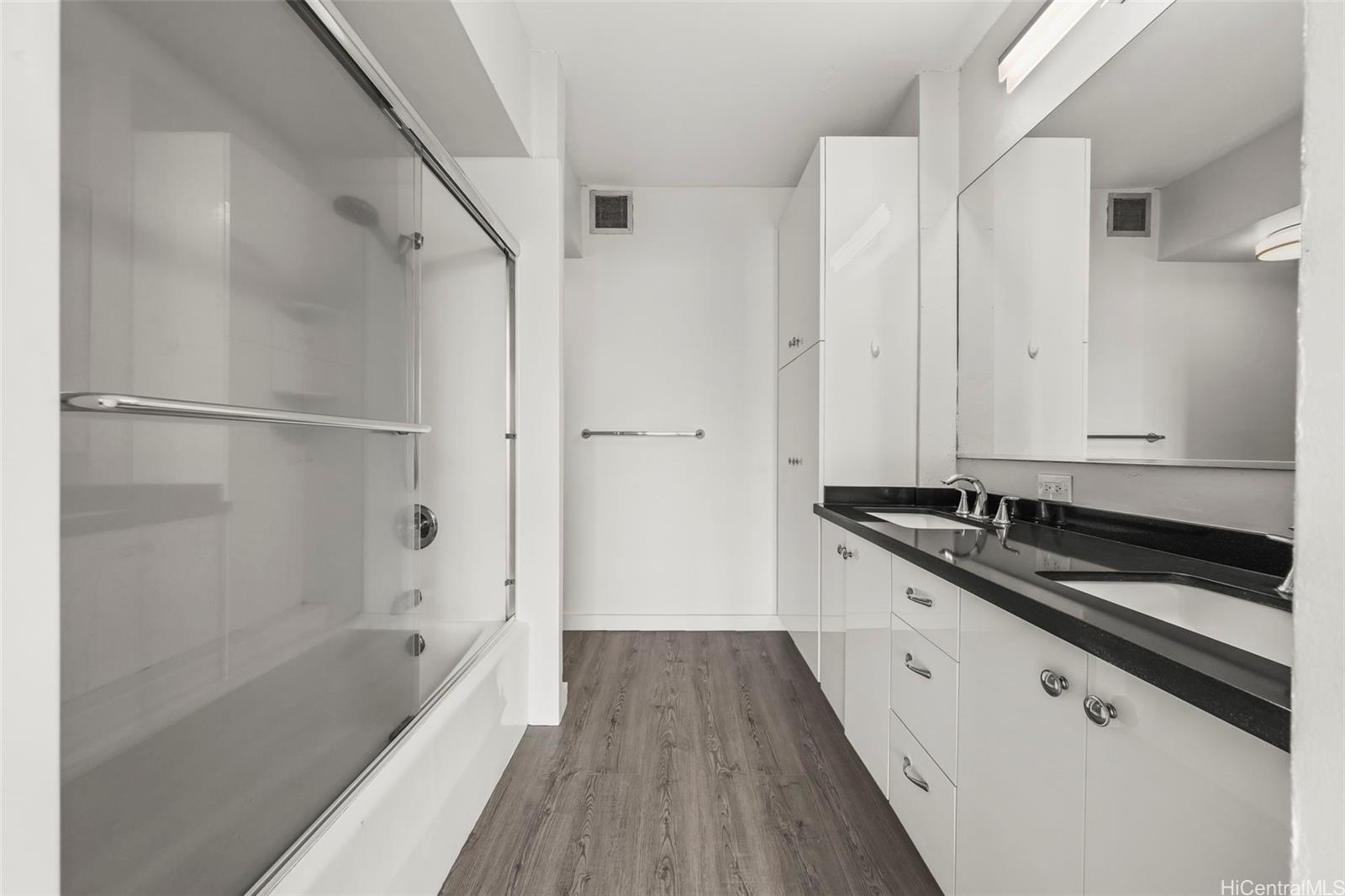 500 Lunalilo Home Road, Unit 17A Honolulu, HI 96825 - Photo 15 of 25 a bathroom with a bathtub and a shower