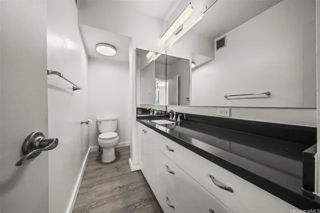 a view of a city from a lake view