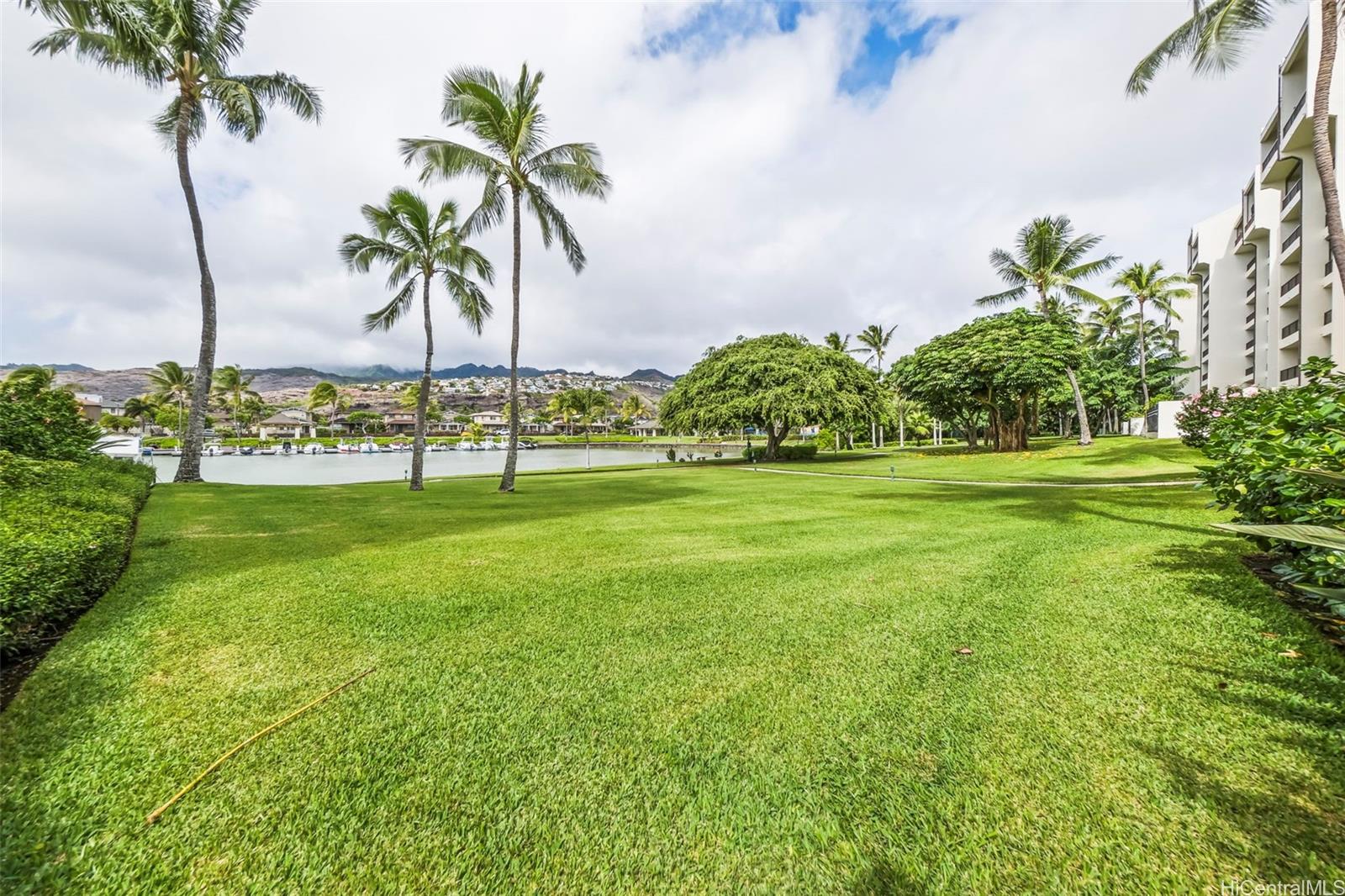 500 Lunalilo Home Road, Unit 17A Honolulu, HI 96825 - Photo 24 of 25 a green field with lots of palm trees