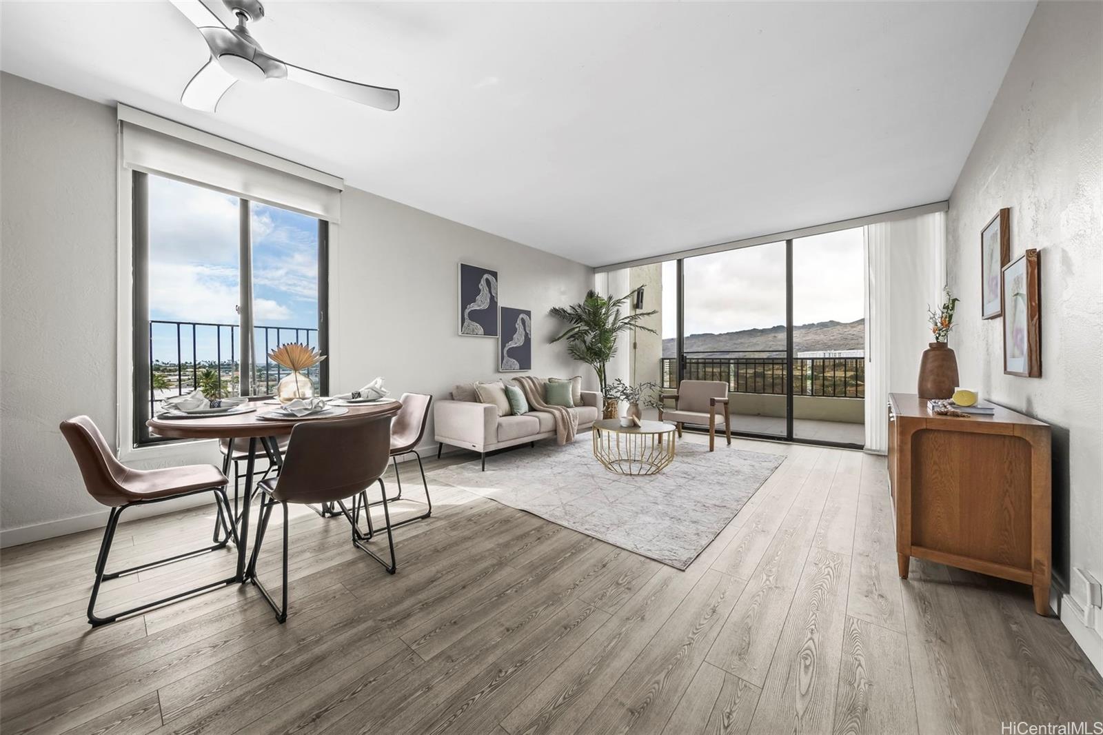 500 Lunalilo Home Road, Unit 17A Honolulu, HI 96825 - Photo 5 of 25 a living room with furniture and a large window