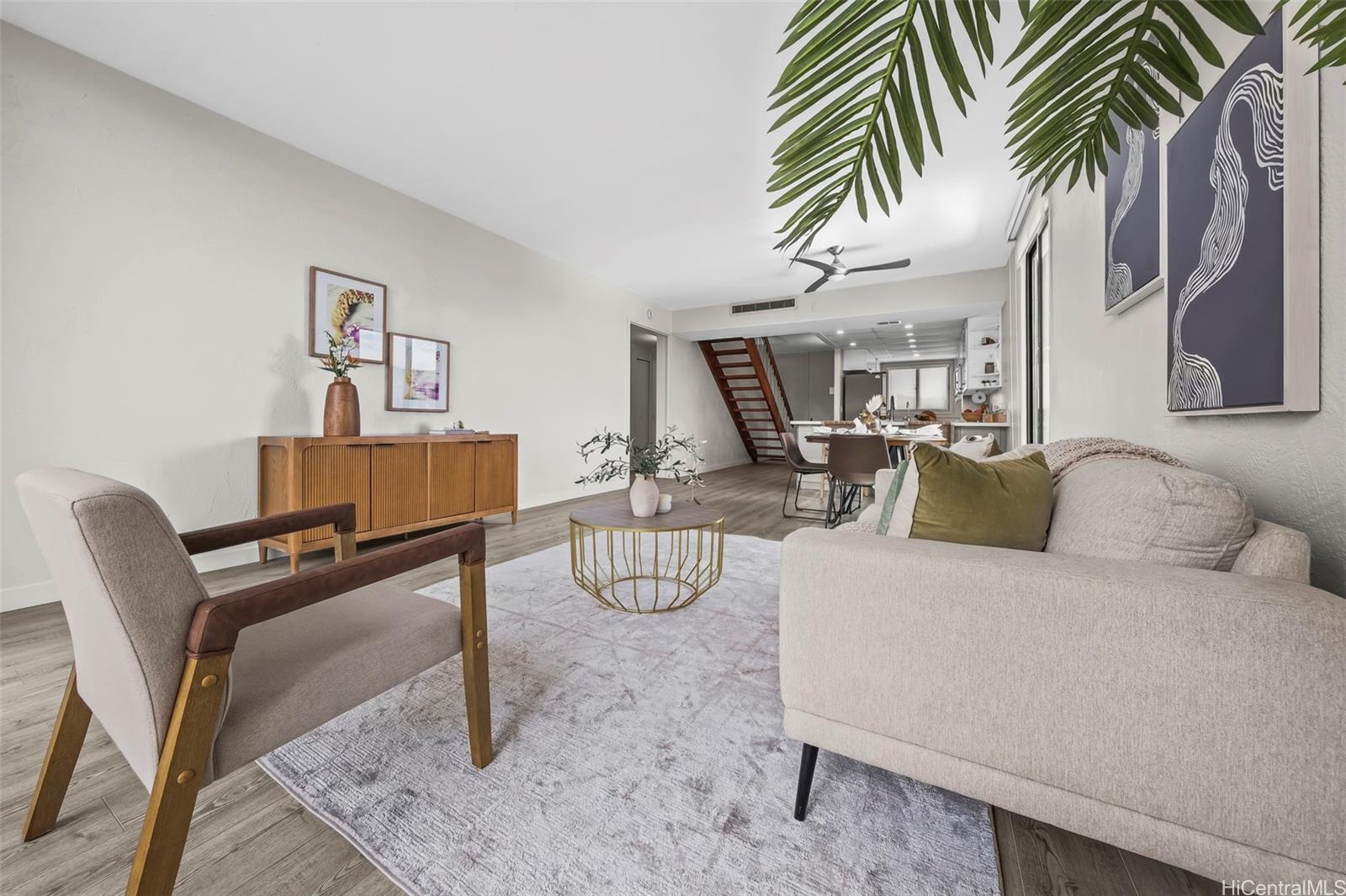 500 Lunalilo Home Road, Unit 17A Honolulu, HI 96825 - Photo 6 of 25 a living room with furniture and a table