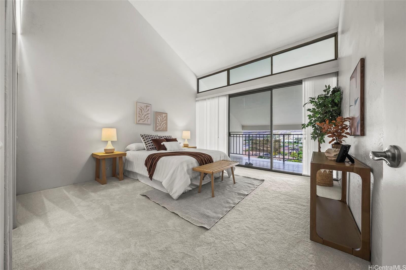 500 Lunalilo Home Road, Unit 17A Honolulu, HI 96825 - Photo 8 of 25 a spacious bedroom with a bed and a large window