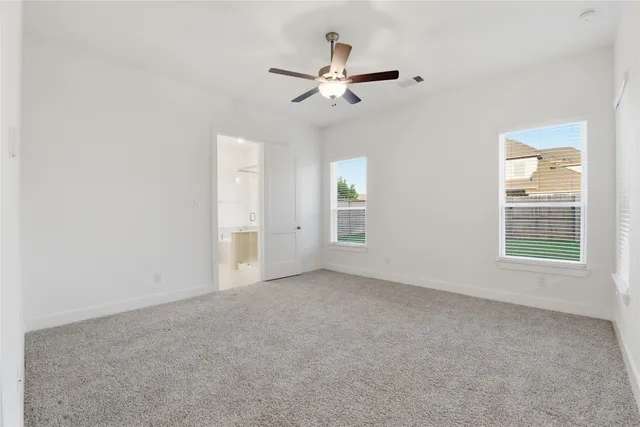 a kitchen with stainless steel appliances granite countertop a sink a stove and a wooden floors