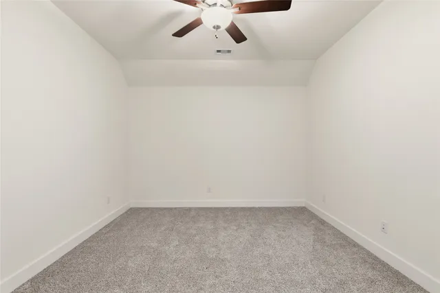 a large kitchen with stainless steel appliances