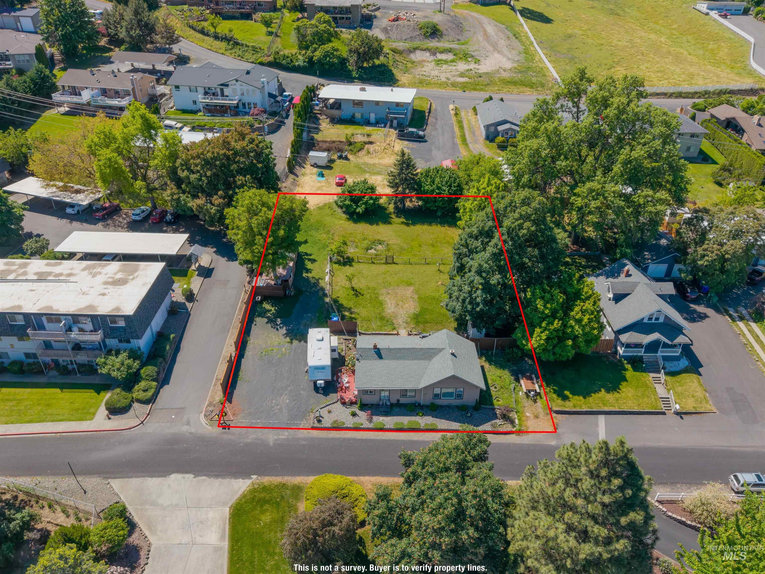 238 Hillcrest Road Lewiston, ID 83501 - Photo 8 of 27 Expansive lot featuring a single-story residence and a substantial grassy area