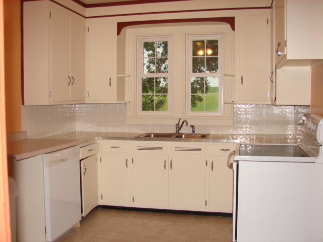 525 West Fairview Road Freeport, IL 61032 - Photo 3 of 6 a kitchen with stainless steel appliances granite countertop a sink and a white cabinets