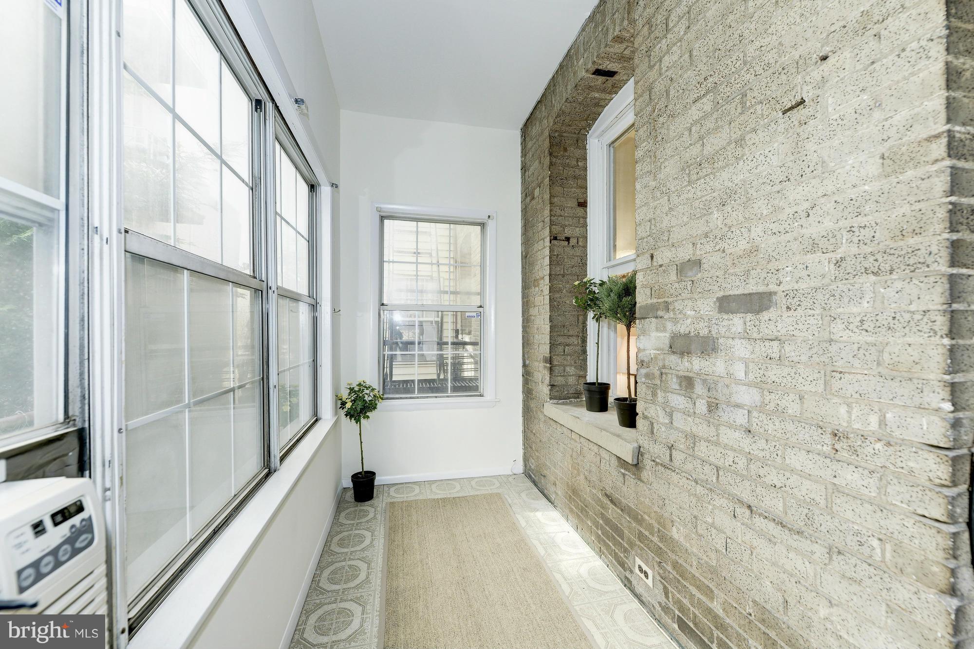 2605 Adams Mill Road Northwest, Unit 2 Washington, DC 20009 - Photo 22 of 30 a view of a entryway door of the house