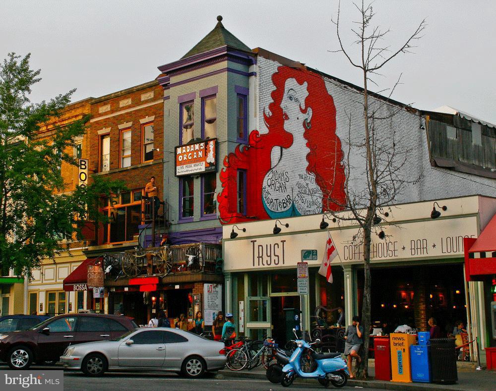 2605 Adams Mill Road Northwest, Unit 2 Washington, DC 20009 - Photo 24 of 30 a view of street with shops