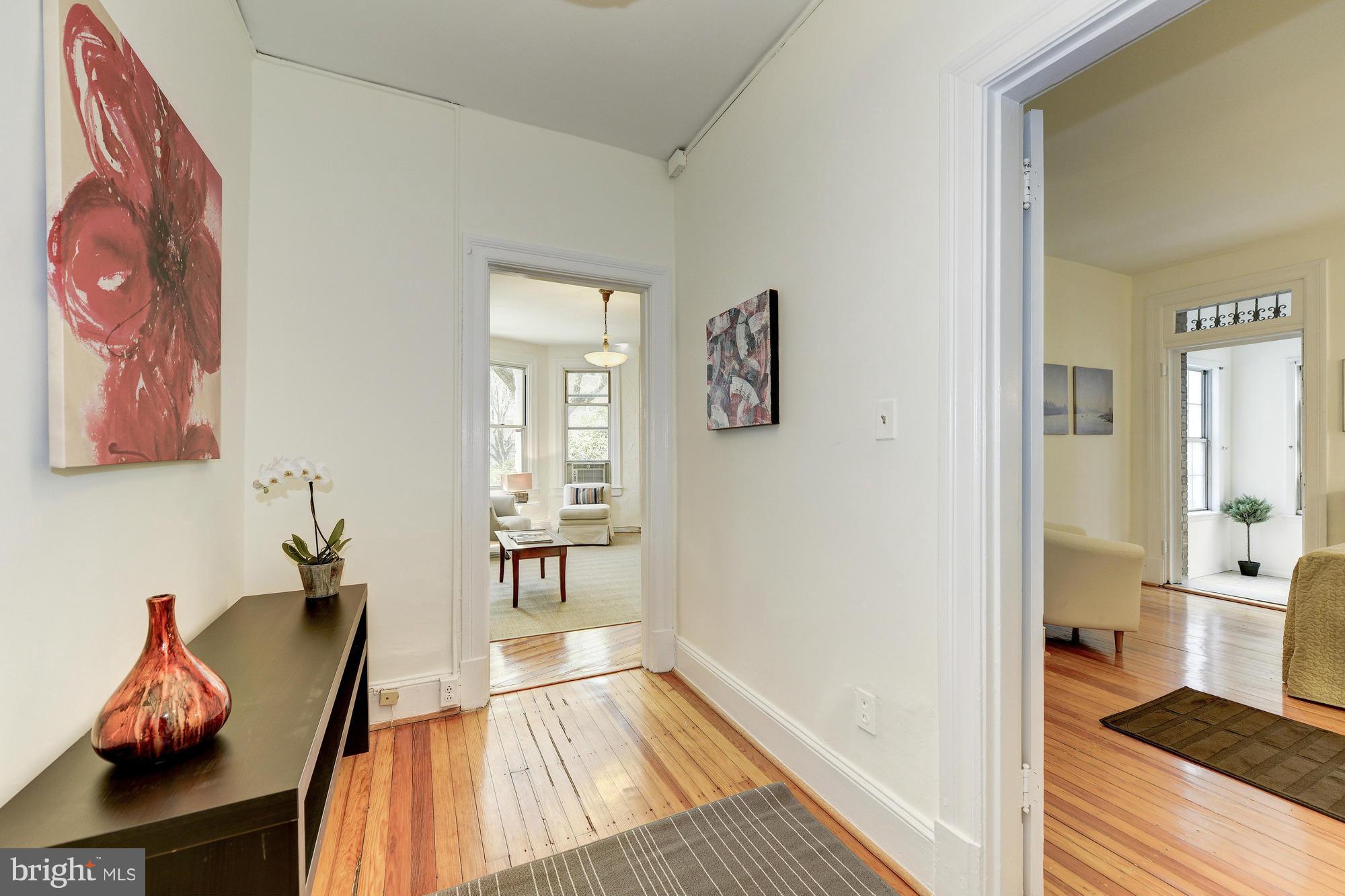 2605 Adams Mill Road Northwest, Unit 2 Washington, DC 20009 - Photo 4 of 30 a view of a living room and dining room