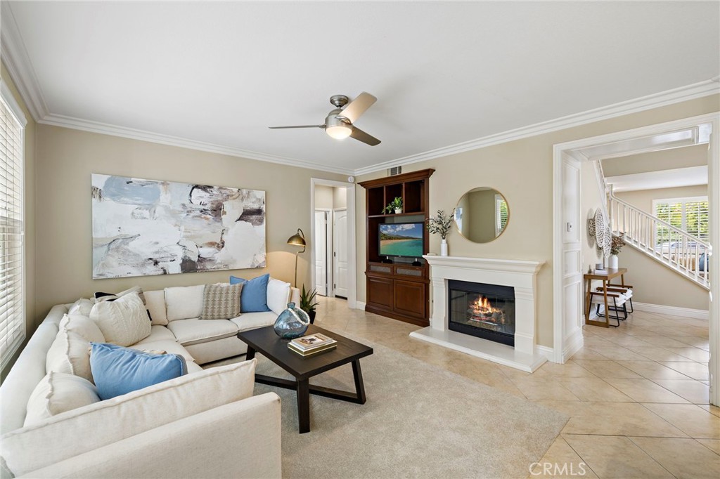 4 Celestine Circle Ladera Ranch, CA 92694 - Photo 11 of 39 a living room with furniture and a fireplace