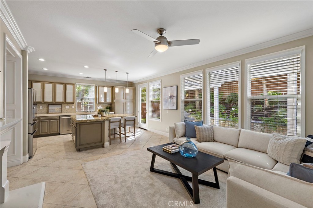 4 Celestine Circle Ladera Ranch, CA 92694 - Photo 13 of 39 a living room with fireplace furniture and a large window