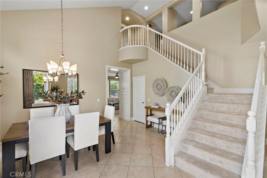 4 Celestine Circle Ladera Ranch, CA 92694 - Photo 4 of 39 a view of entryway dining room and hall with a chandelier