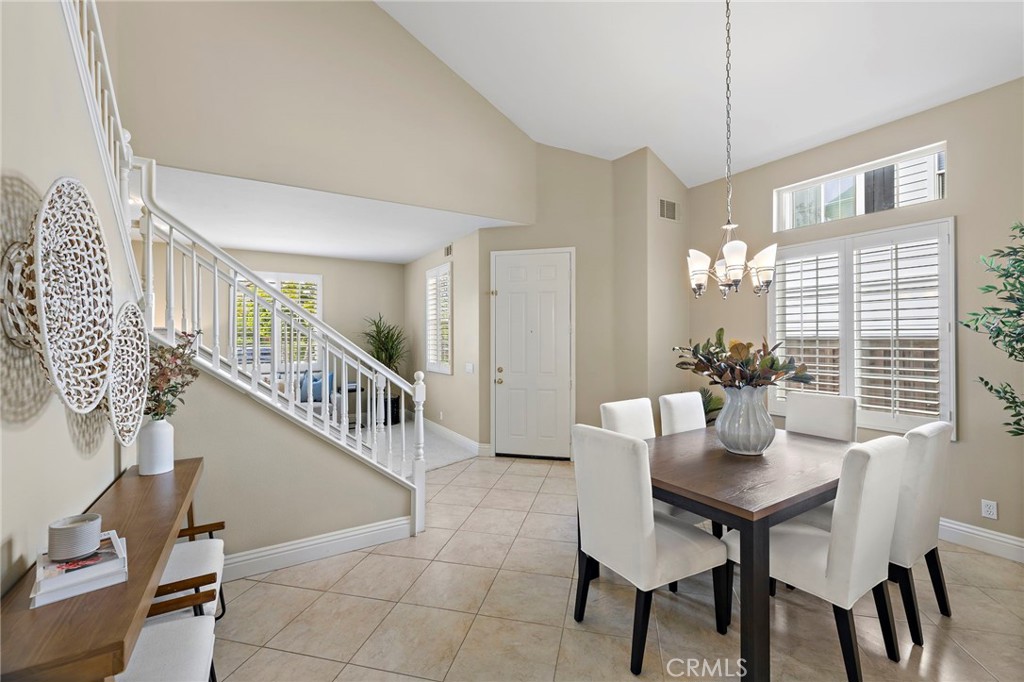 4 Celestine Circle Ladera Ranch, CA 92694 - Photo 6 of 39 a view of a dining room with furniture and a chandelier