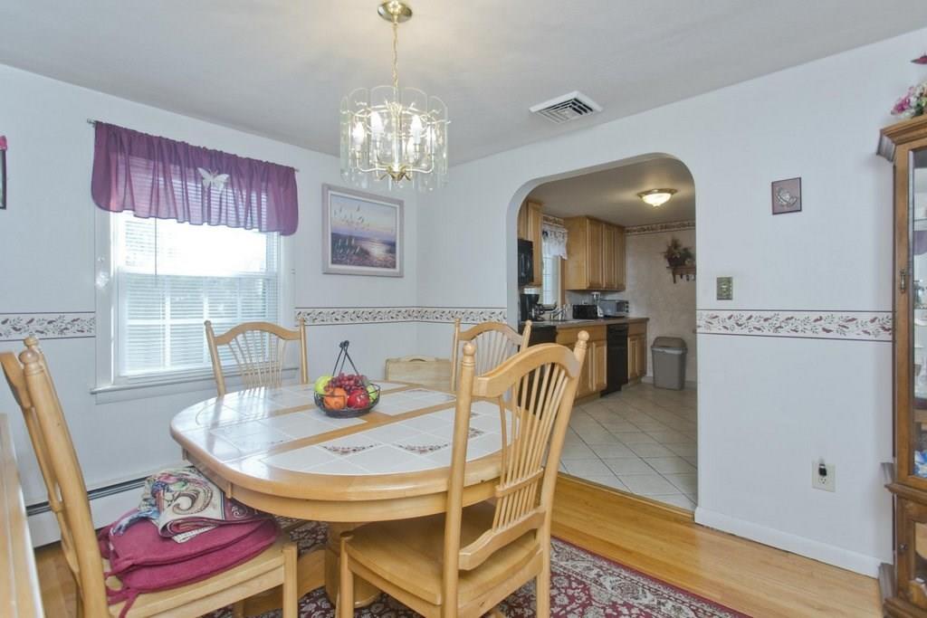 17 Arthur Street Springfield, MA 01104 - Photo 11 of 36 a view of a dining room with furniture and chandelier