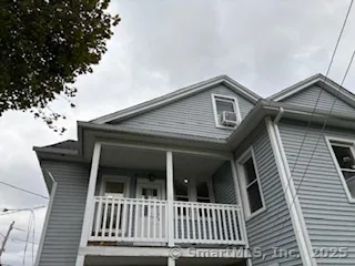 a view of a house with a porch