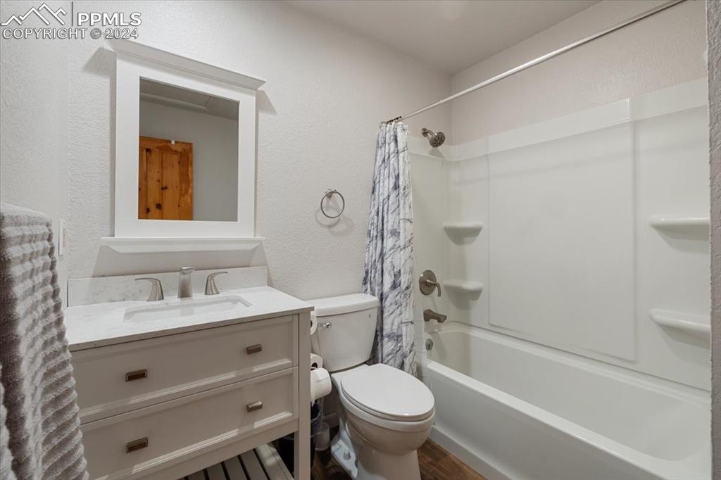 123 Maroon Lake Circle Divide, CO 80814 - Photo 29 of 47 a bathroom with a sink toilet and shower