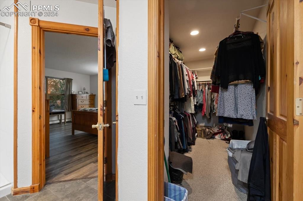 123 Maroon Lake Circle Divide, CO 80814 - Photo 38 of 47 a view of a hallway with closet and a livingroom view