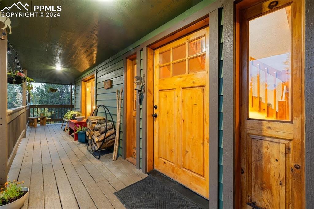 123 Maroon Lake Circle Divide, CO 80814 - Photo 4 of 47 a view of living room with furniture and windows