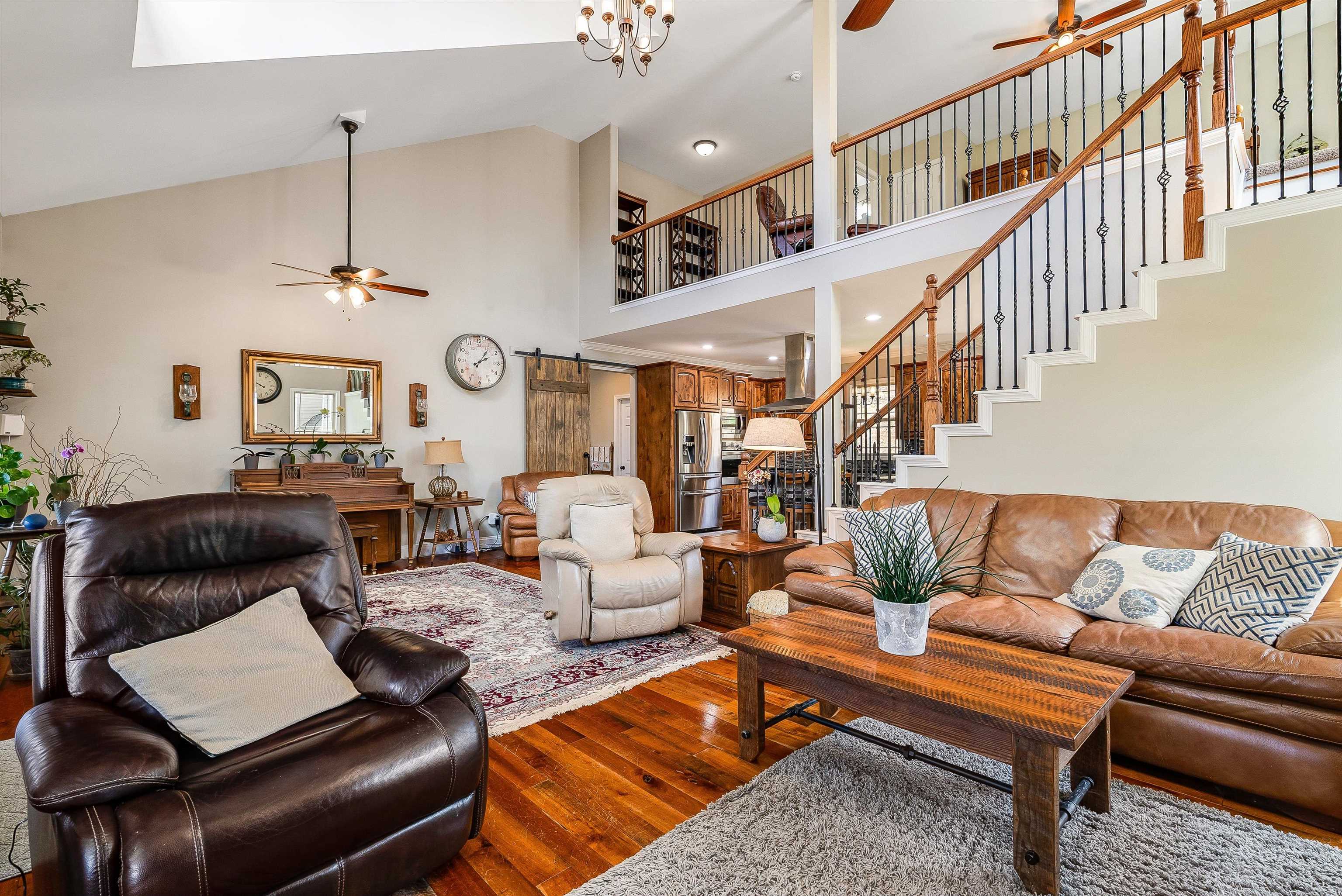 920 Wagon Shop Road Middlebrook, VA 24459 - Photo 13 of 75 a living room with furniture ceiling fan and a rug