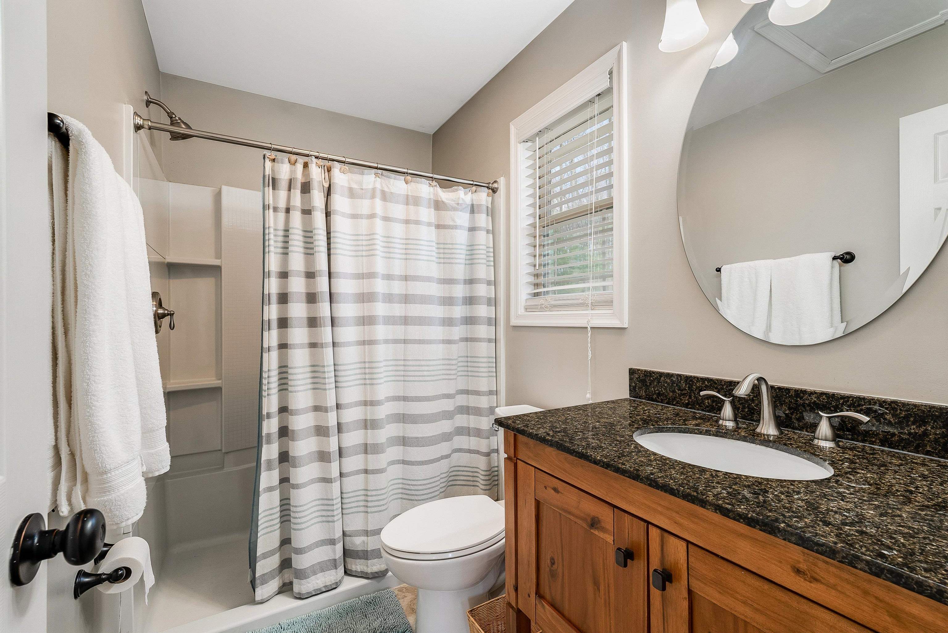 920 Wagon Shop Road Middlebrook, VA 24459 - Photo 23 of 75 a bathroom with a granite countertop sink toilet and shower