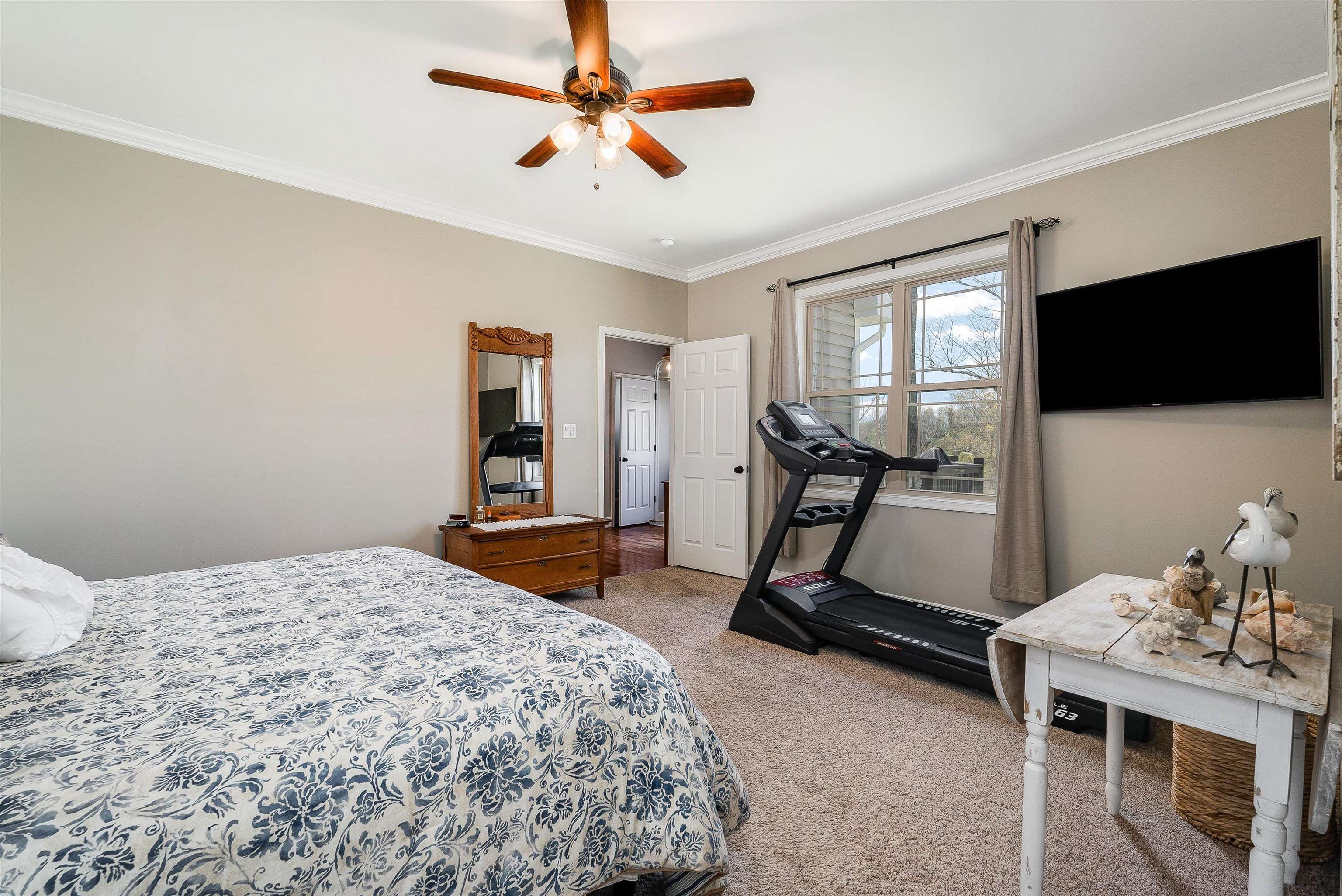 920 Wagon Shop Road Middlebrook, VA 24459 - Photo 29 of 75 a bedroom with a bed and a flat screen tv
