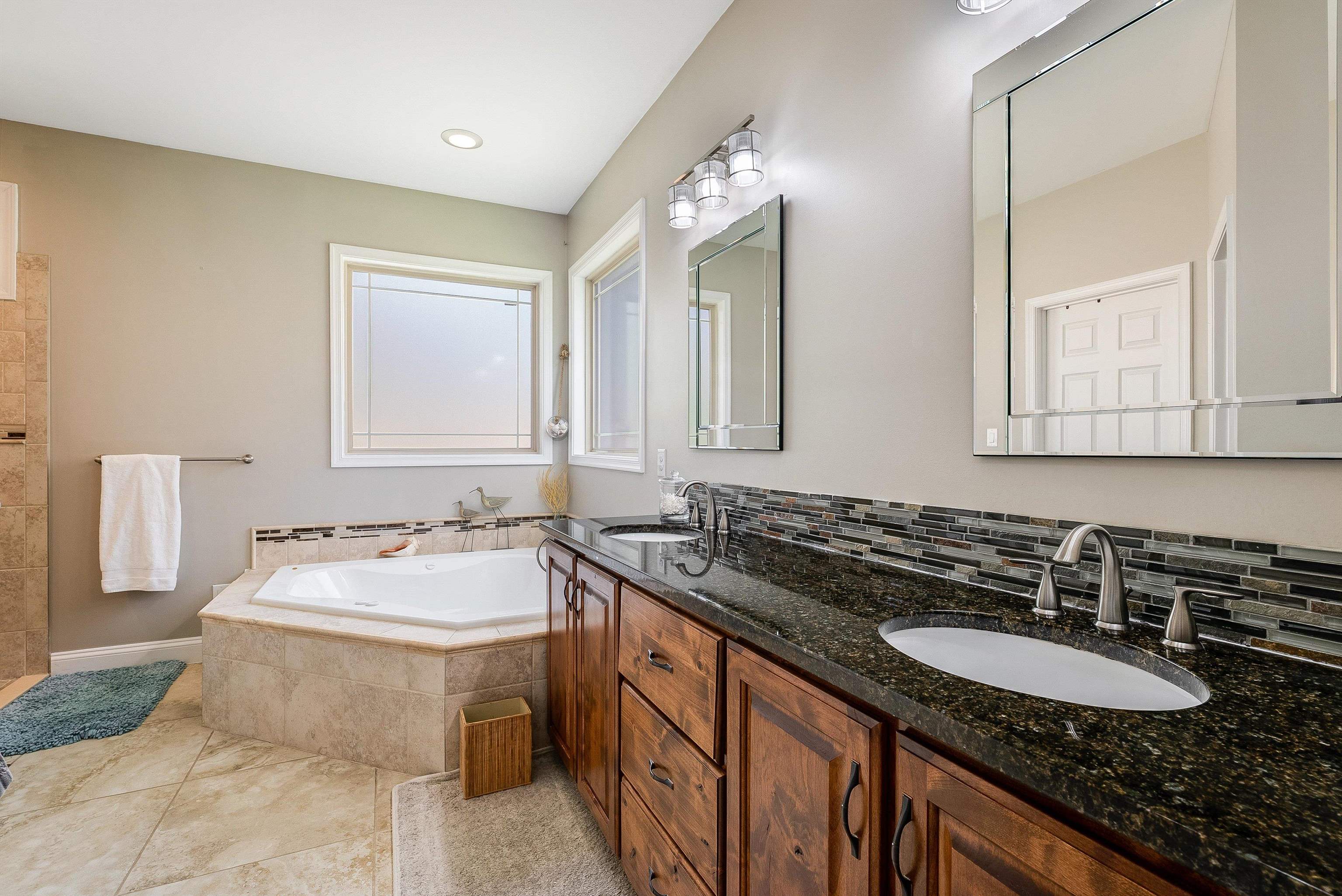 920 Wagon Shop Road Middlebrook, VA 24459 - Photo 30 of 75 a bathroom with a sink double vanity granite tub and a mirror