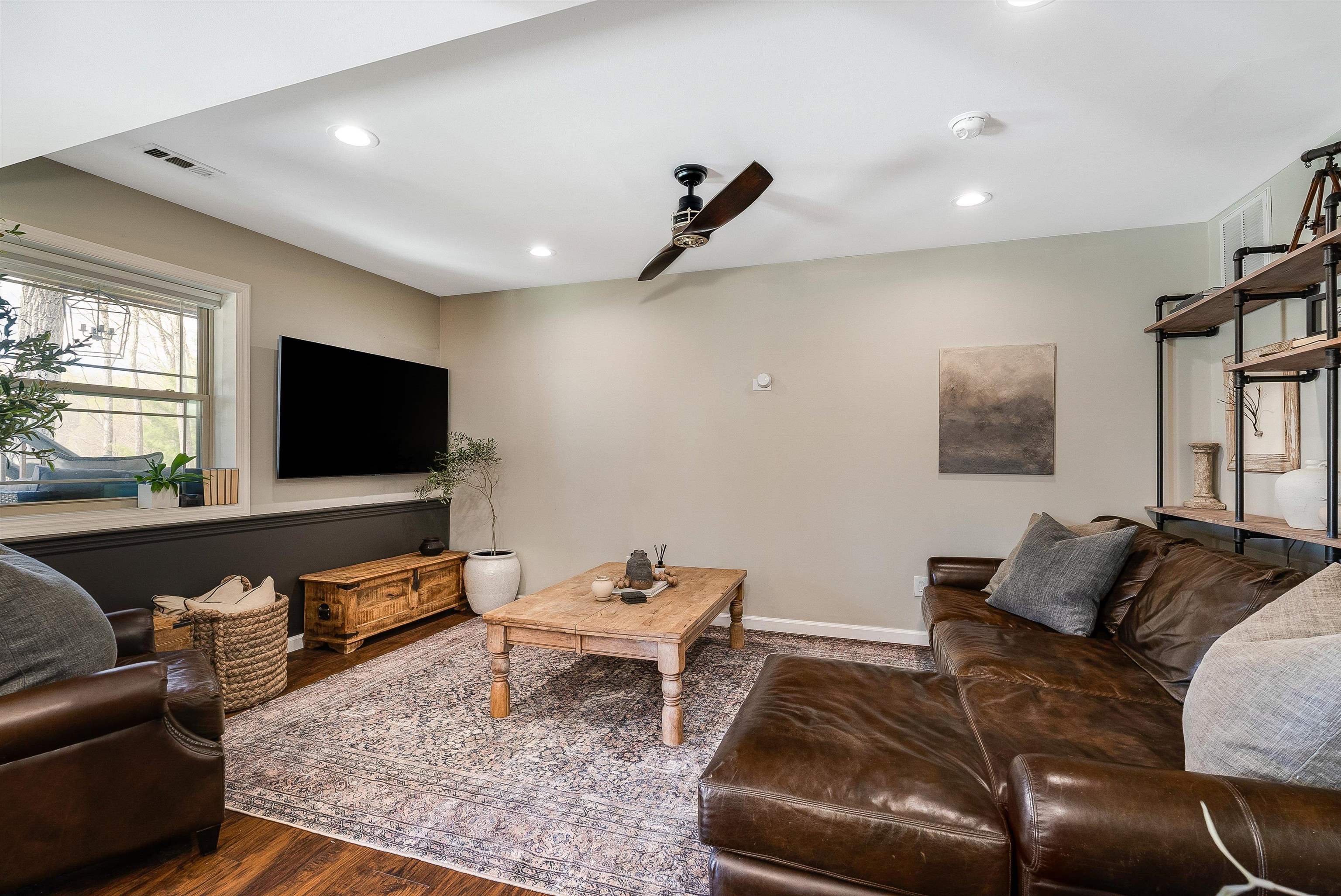 920 Wagon Shop Road Middlebrook, VA 24459 - Photo 37 of 75 a living room with furniture and a flat screen tv