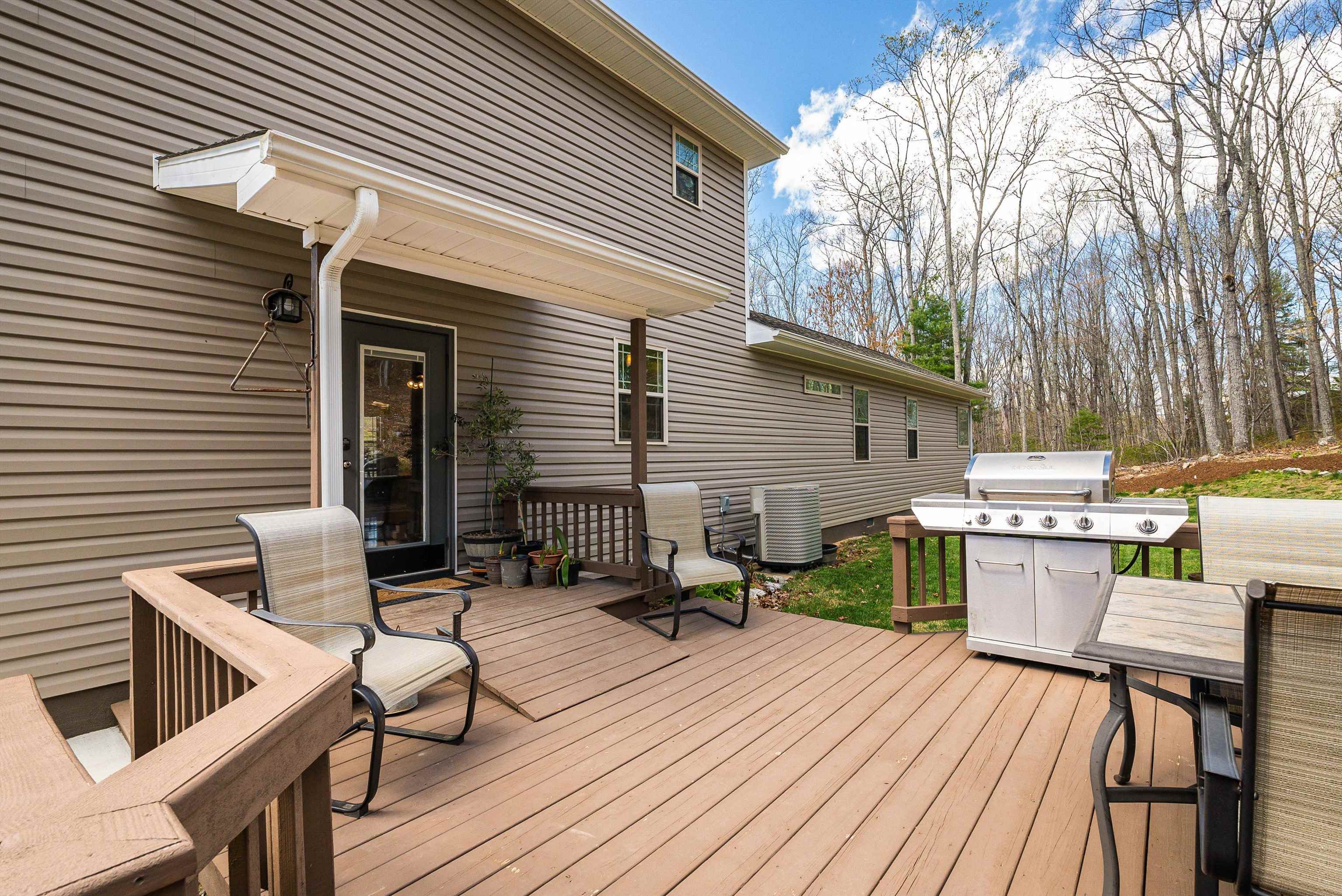 920 Wagon Shop Road Middlebrook, VA 24459 - Photo 65 of 75 a view of deck with table and chairs and wooden floor