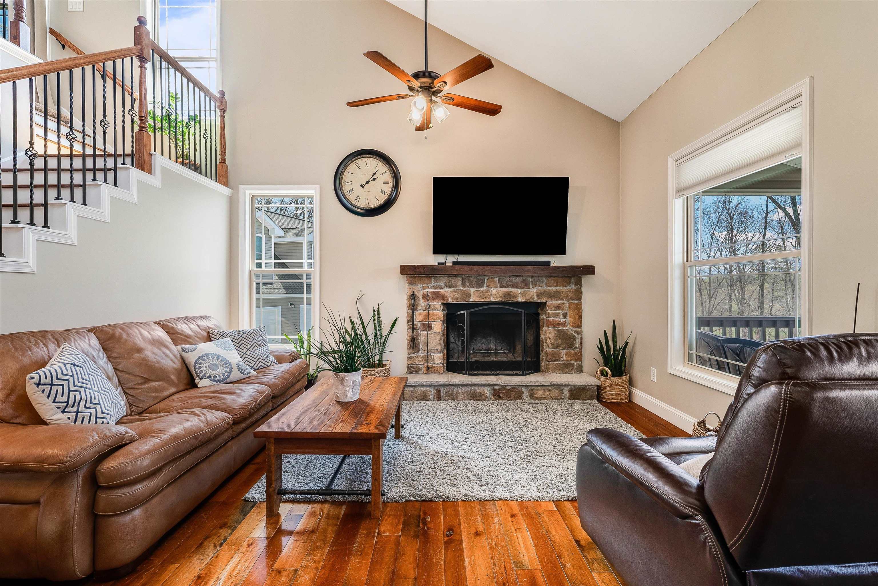 920 Wagon Shop Road Middlebrook, VA 24459 - Photo 10 of 75 a living room with furniture a flat screen tv and a fireplace