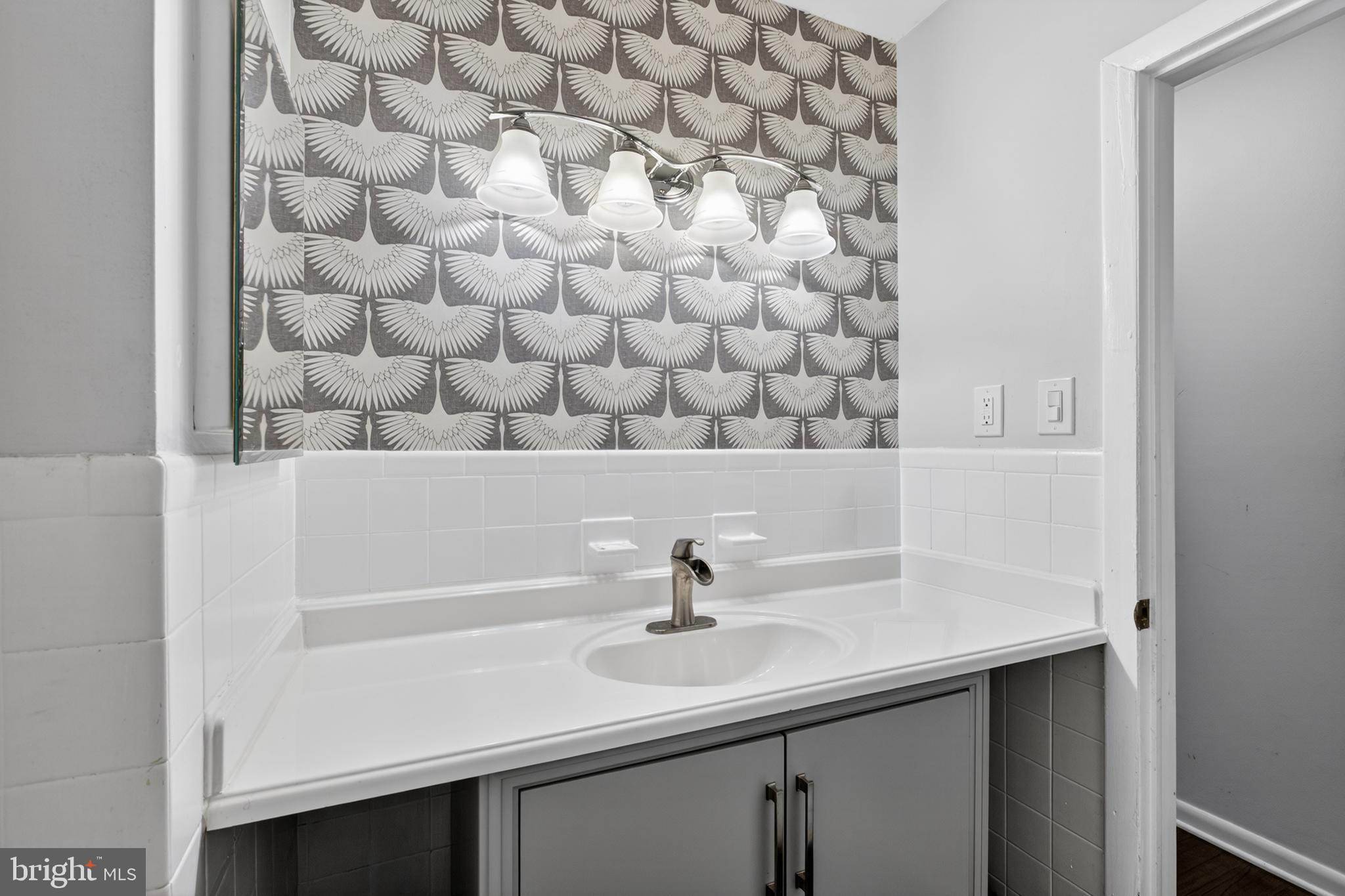 216 Revere Road Marlton, NJ 08053 - Photo 18 of 47 a bathroom with a sink and vanity
