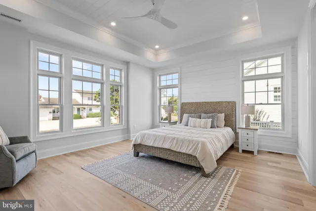 a bathroom with double sink and a mirror