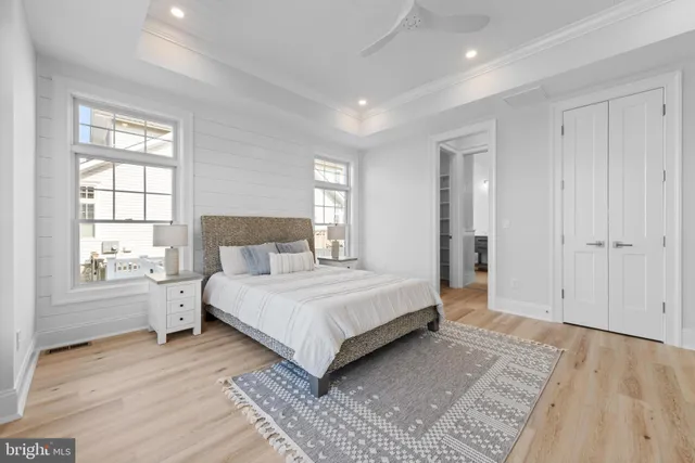 a bathroom with a shower sink and mirror