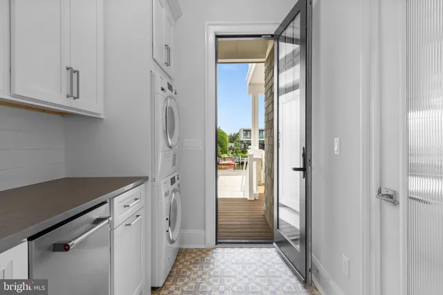 a view of swimming pool with outdoor seating and a lots of buildings in the background