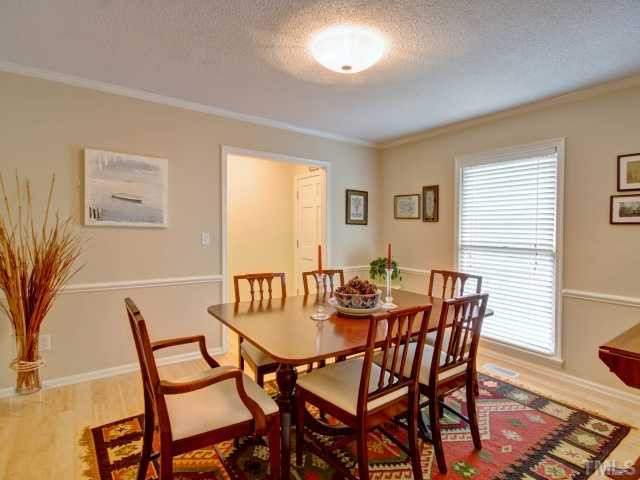 8804 Broadmore Court Raleigh, NC 27613 - Photo 12 of 23 Enjoy your favorite meals with friends and family in the dining room! Dining Room