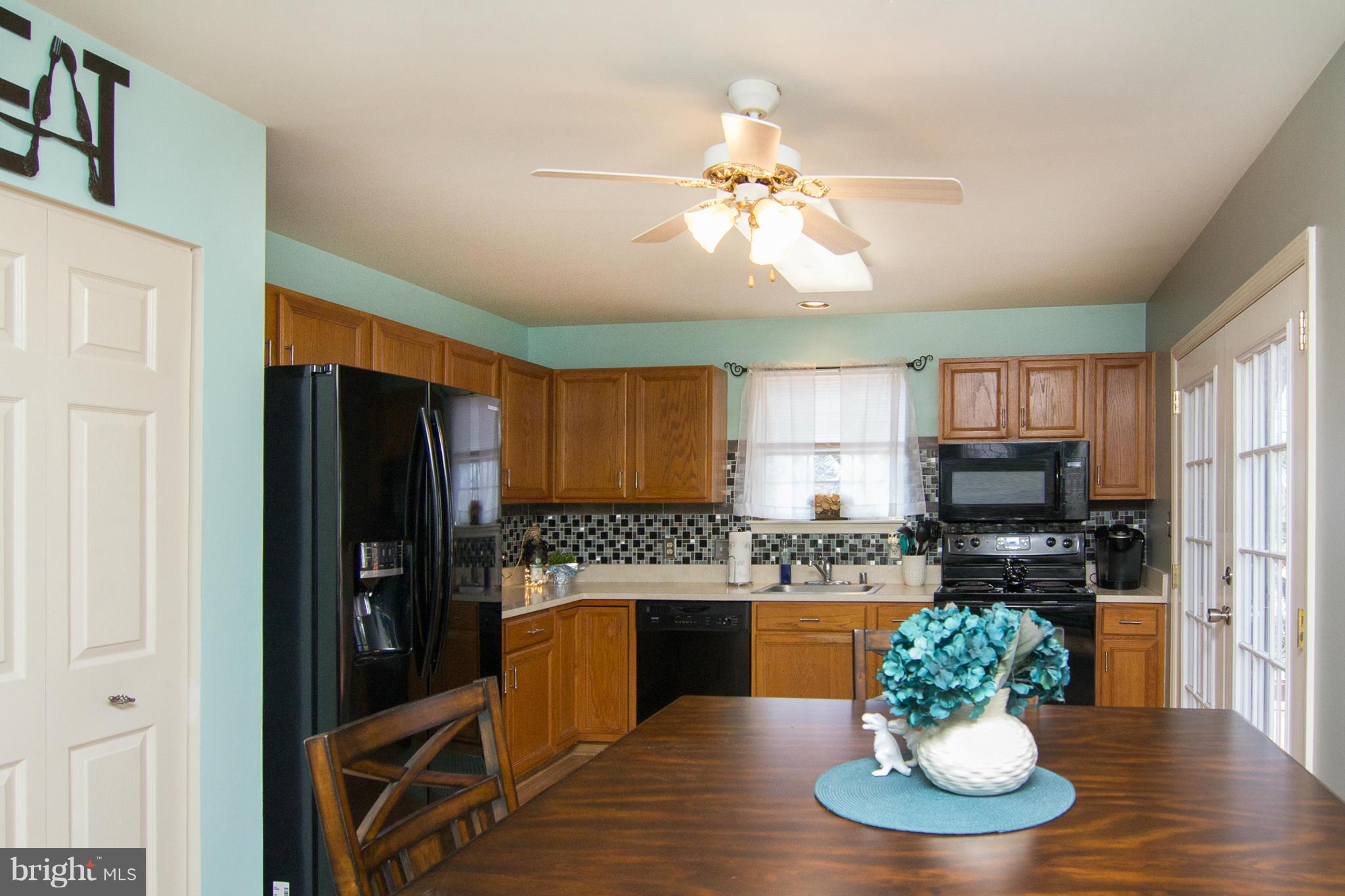 961 Firestone Road Westminster, MD 21158 - Photo 15 of 30 Kitchen w/ newer appliances & backsplash