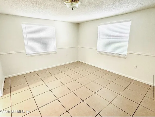 a view of a room and window