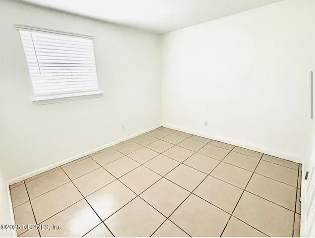 a view of a room and window