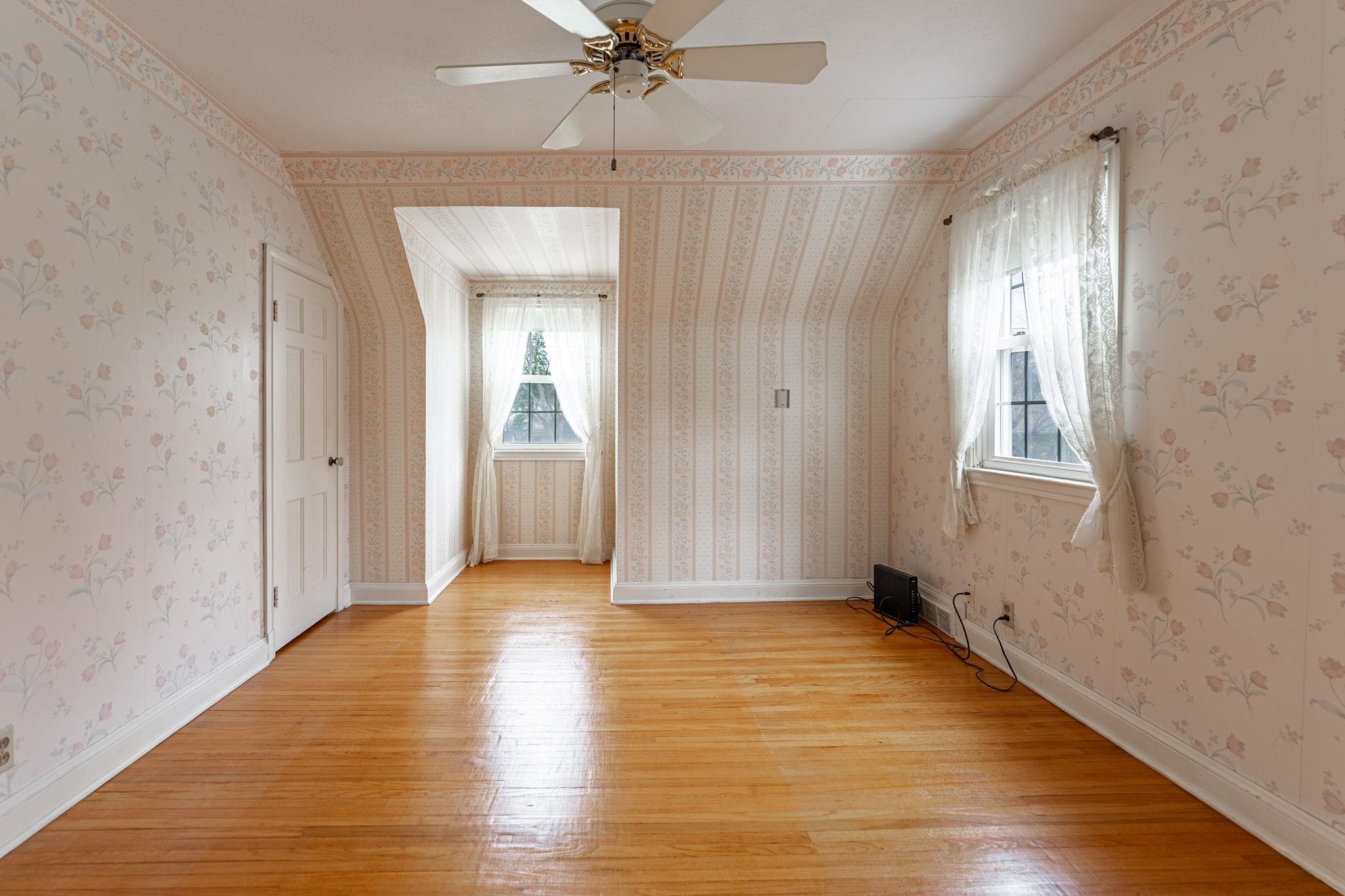 2705 Rural Street Rockford, IL 61107 - Photo 25 of 31 a view of an empty room with wooden floor and a window