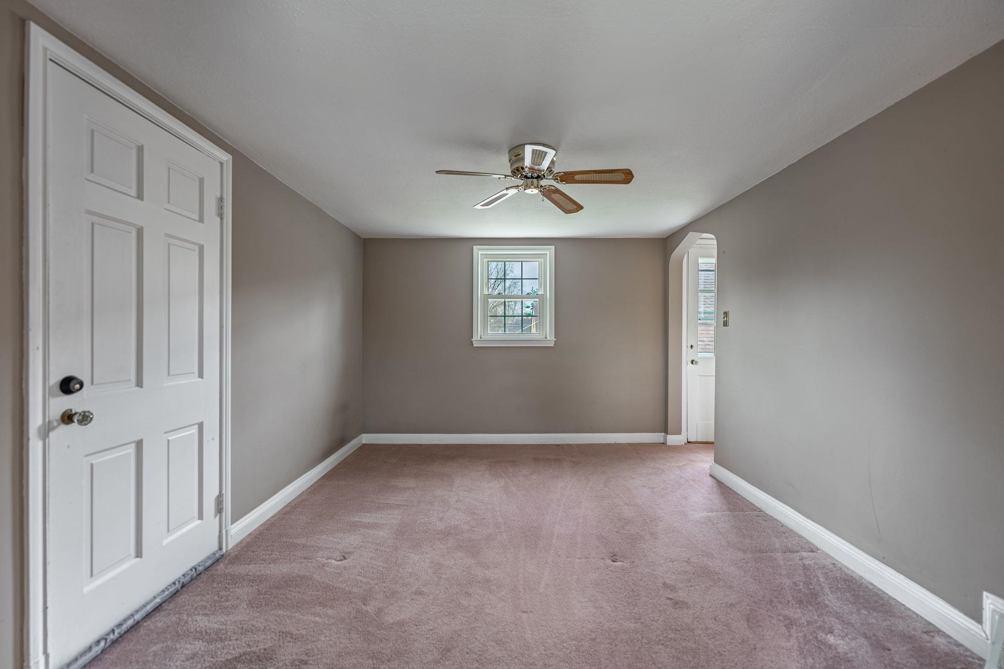 2705 Rural Street Rockford, IL 61107 - Photo 28 of 31 an empty room with windows and fan