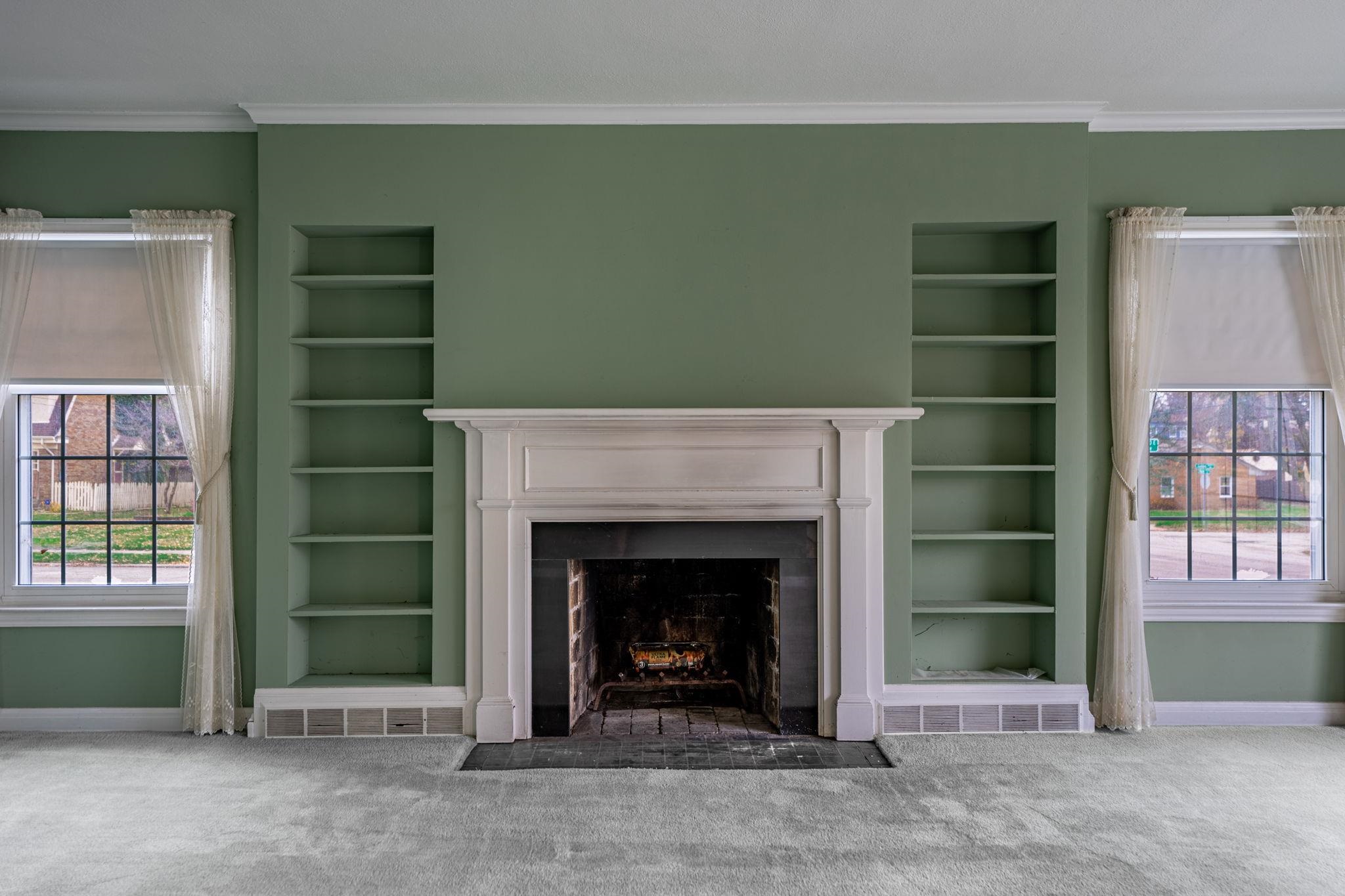 2705 Rural Street Rockford, IL 61107 - Photo 8 of 31 a living room with a fireplace