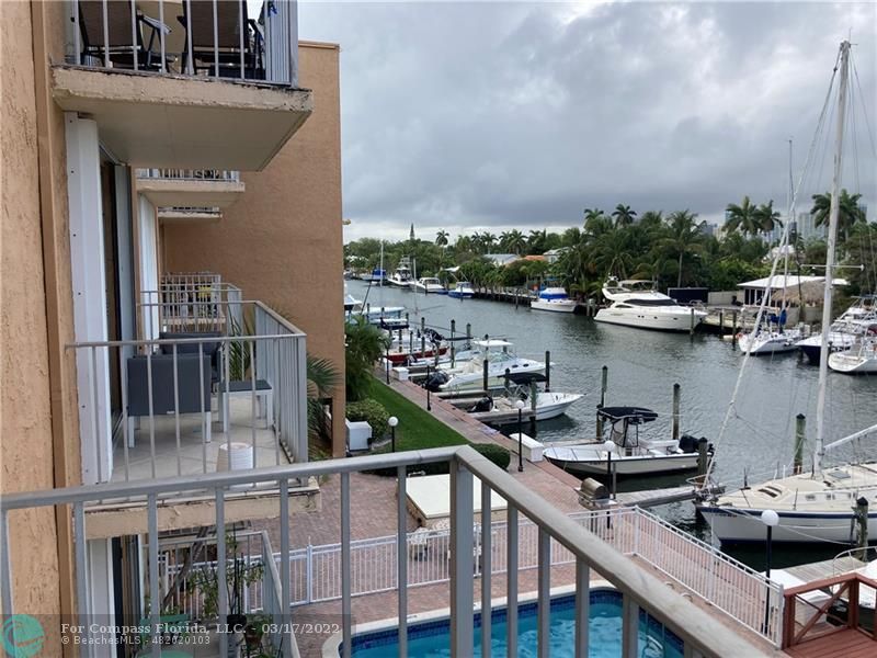 1777 Southeast 15th Street, Unit 312 Fort Lauderdale, FL 33316 - Photo 13 of 17 a view of a lake from a balcony