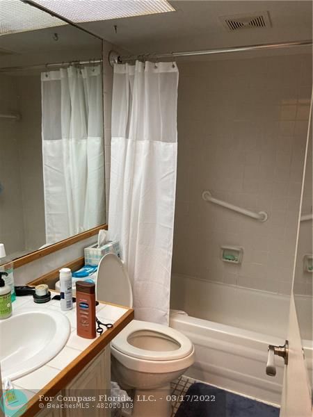 1777 Southeast 15th Street, Unit 312 Fort Lauderdale, FL 33316 - Photo 14 of 17 a bathroom with a sink toilet and shower