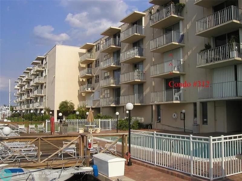 1777 Southeast 15th Street, Unit 312 Fort Lauderdale, FL 33316 - Photo 7 of 17 a view of a building with glass windows